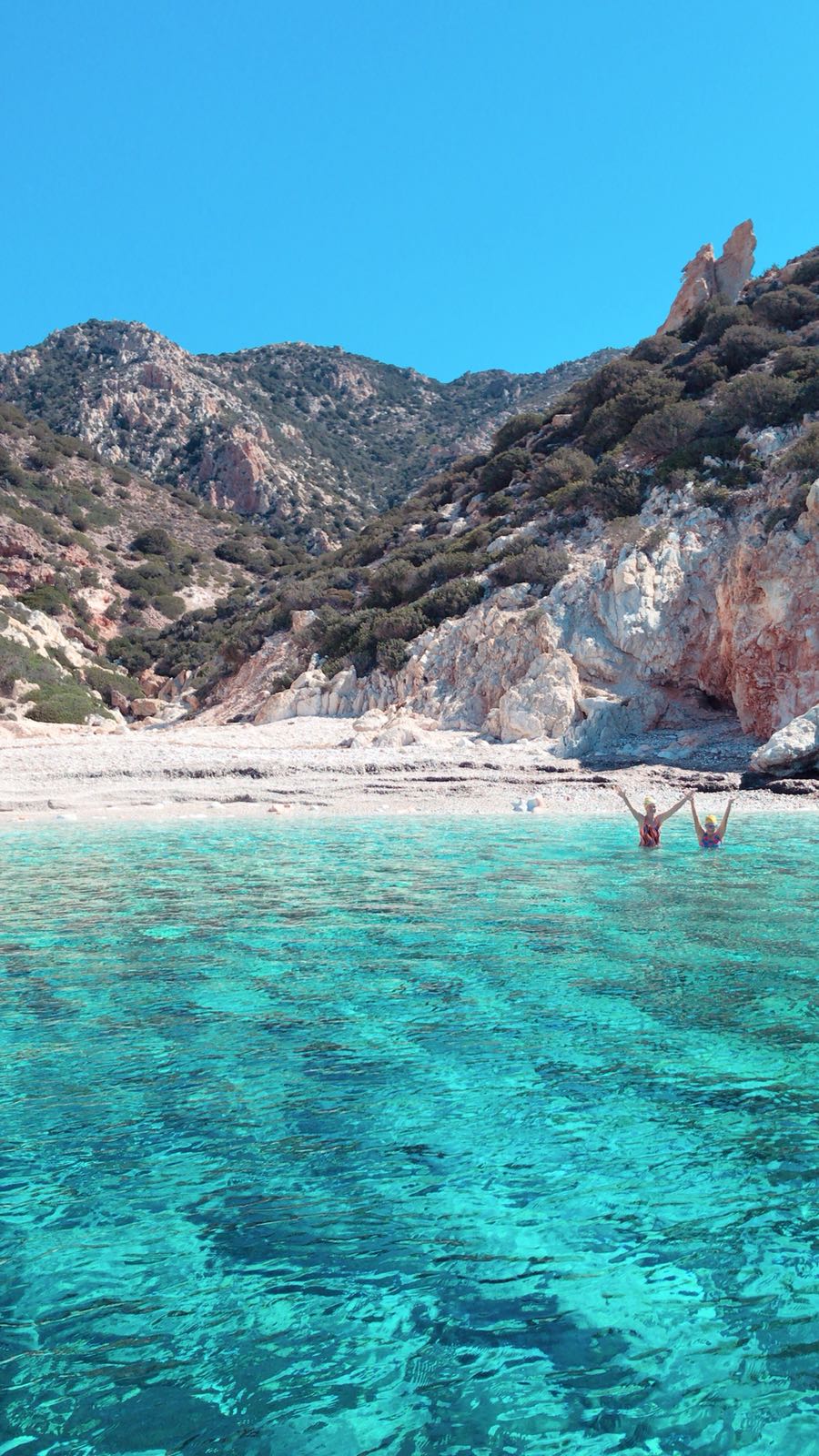 swimming_holidays_greece_milos_ricky_waving_swimmers.jpg