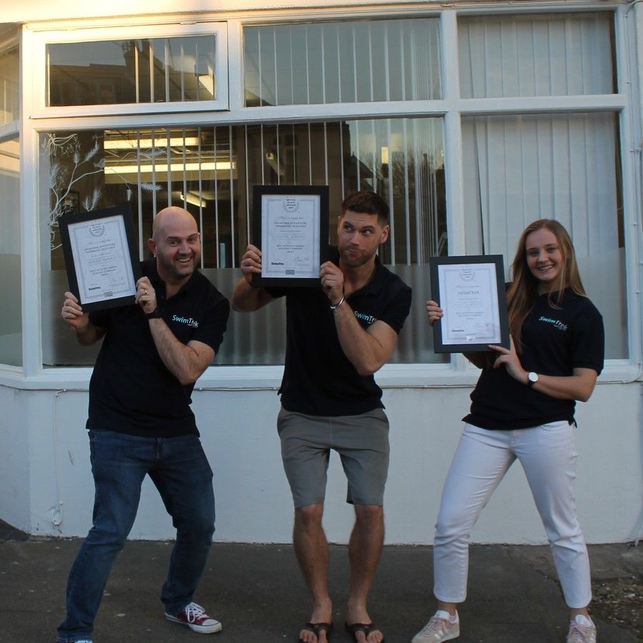 Thomas, Ben and Olivia showing off our British Travel awards