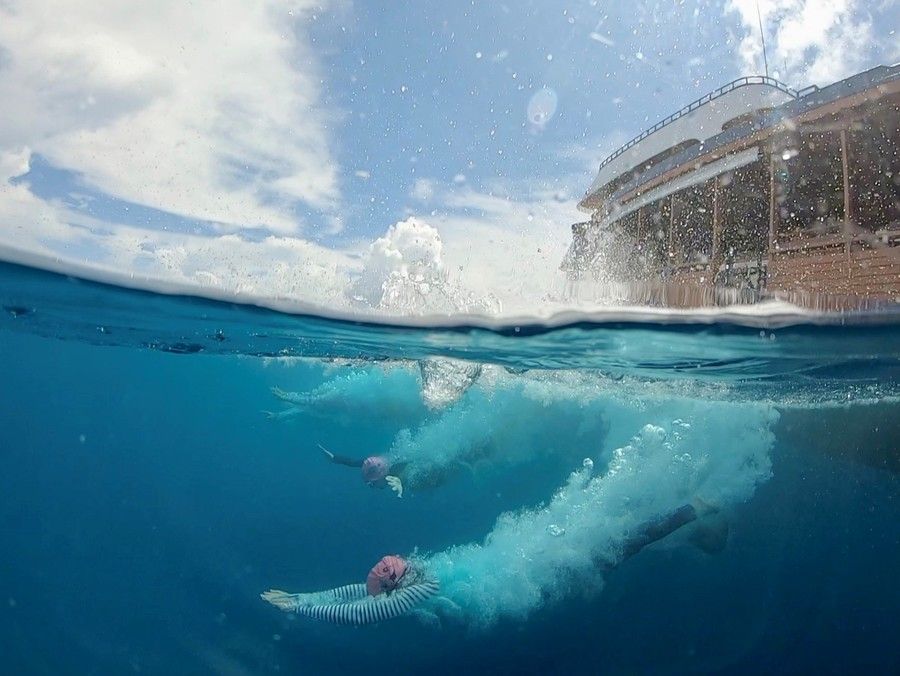 diving into the water in the Maldives.jpg